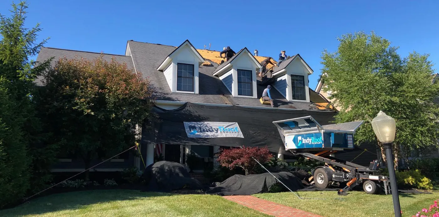 Tarping and dry-in on a Scottsburg commercial roof